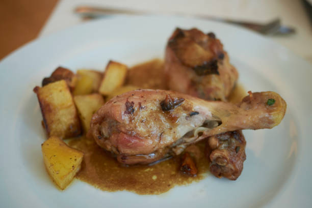 istock Chicken legs and roasted potatoes 1021736858