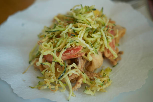 istock Fried seafood with fried zucchini 1021737094