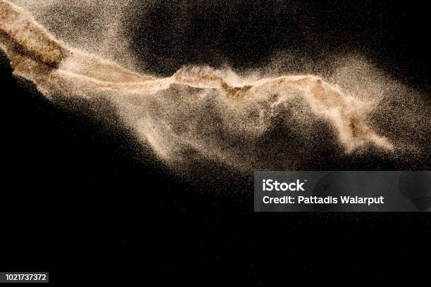 Golden Sand Explosion Isolated On Black Background Abstract Sand Cloud Stock Photo - Download Image Now