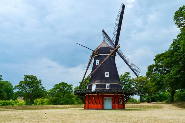 istock Beautiful old windmill in a green park. Architecture. 1021743926