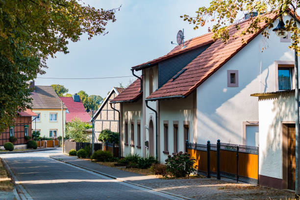 istock idyllic street in a village 1021744240