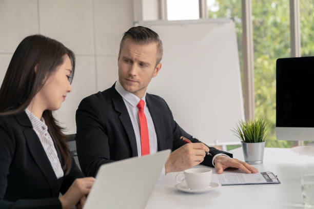istock Young business man presented or discuss to client about business project in coference or meeting room. 1021755342