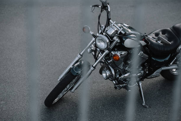 istock classic cruiser motorcycle standing on asphalt road 1021766172