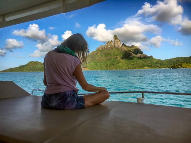 istock Morning yoga with Mount Otemanu 1021775552