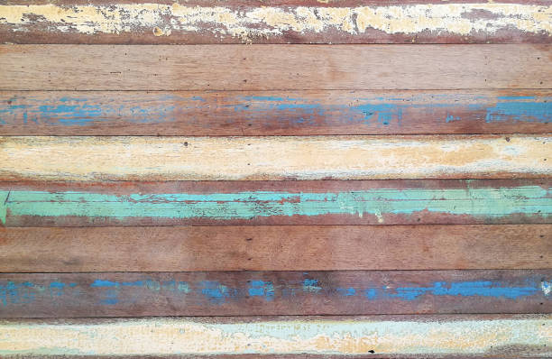 Abstract Background : Grunge retro wooden background with oil paint fed off. stock photo