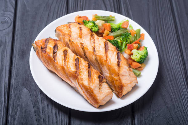 istock Grilled salmon fish with vegetables 1021787726
