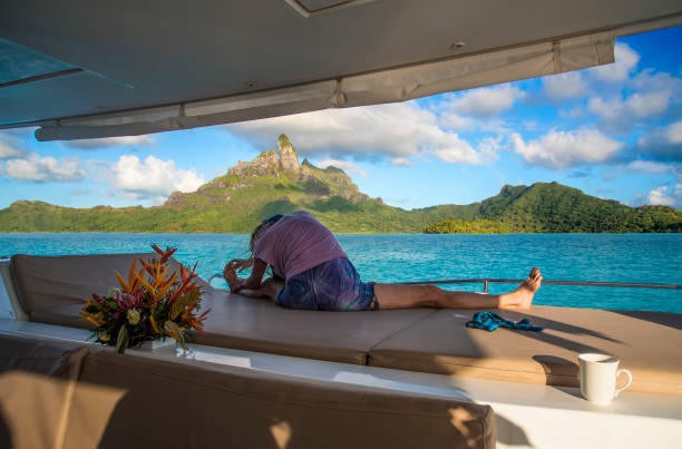 istock Yoga stretch with Bora Bora view 1021790586