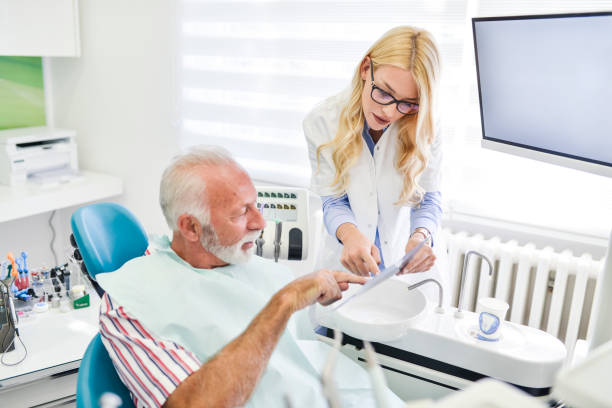 istock Patient getting a dental treatment at clinic 1021797002