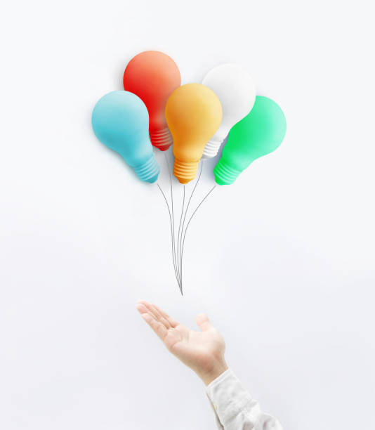 Businessman with colorful balloon light bulb.business creativity idea