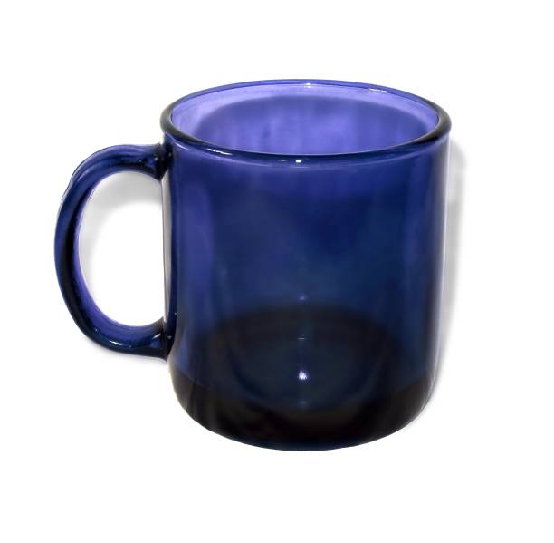 istock Cup of blue glass with handle isolated on a white. 1021799866
