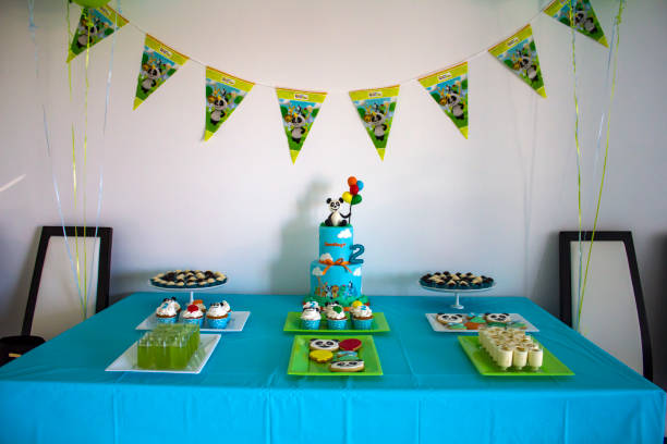 istock Birthday table with cake and desserts 1021808252