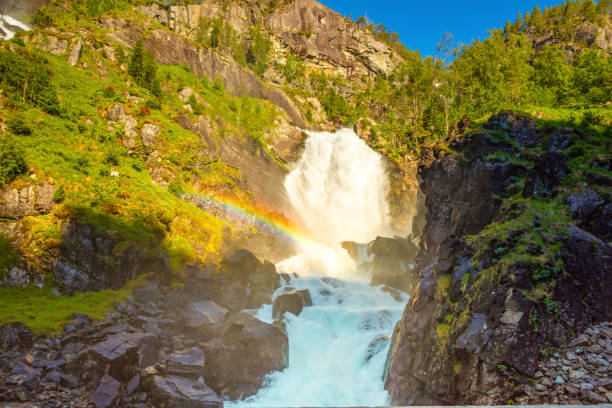 istock Waterfall Latefossen at sunset lights in summer, Norway 1021814420