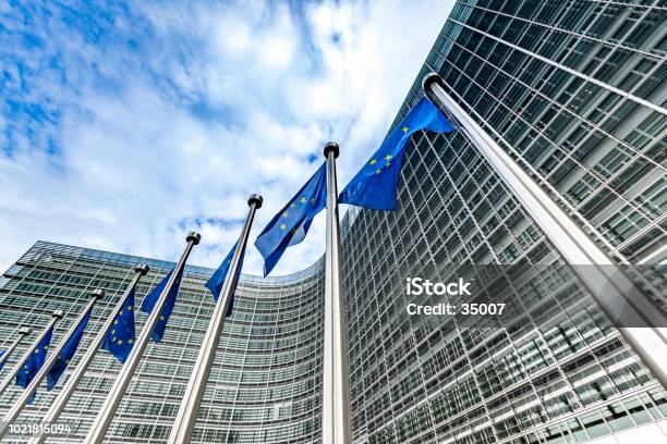 European Union Blue And Gold Flags Flying In Brussels Belgium Stock Photo - Download Image Now