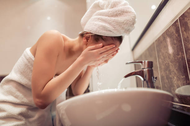 istock Woman in bathroom 1021827176