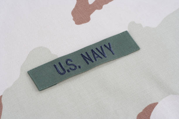 istock US NAVY branch tape on desert camouflage uniform 1021830412