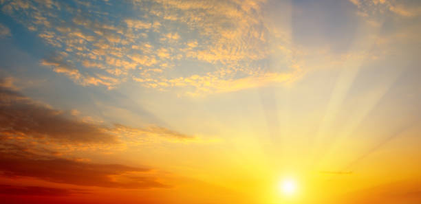 istock Cloudy sky and bright sunrise over the horizon. 1021830466