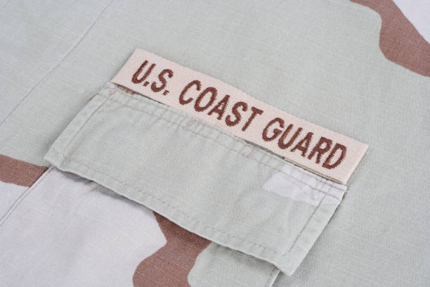 istock US COAST GUARD branch tape on desert camouflage uniform 1021832714