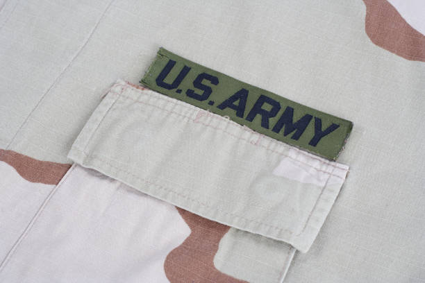 istock US ARMY branch tape on desert camouflage uniform 1021833056