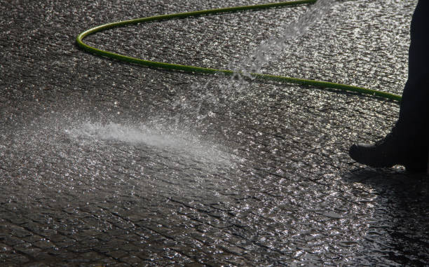 istock Wet cleaning of street. 1021836464