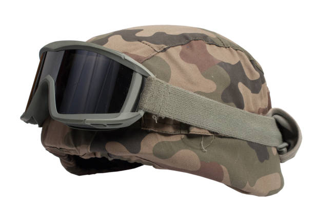 istock kevlar helmet with camouflage cover and protective goggles 1021838768