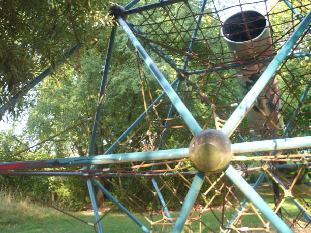 istock Close up ingenious metallic playground equipment 1021854826