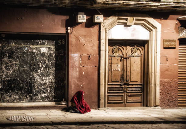 istock A beggar in the street 1021887010