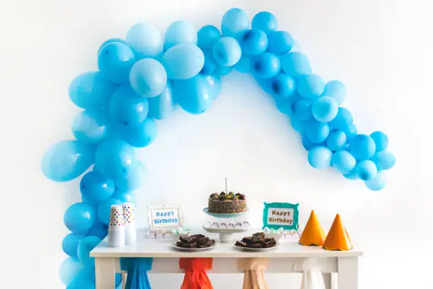 Photo of Kids birthday party decoration and cake