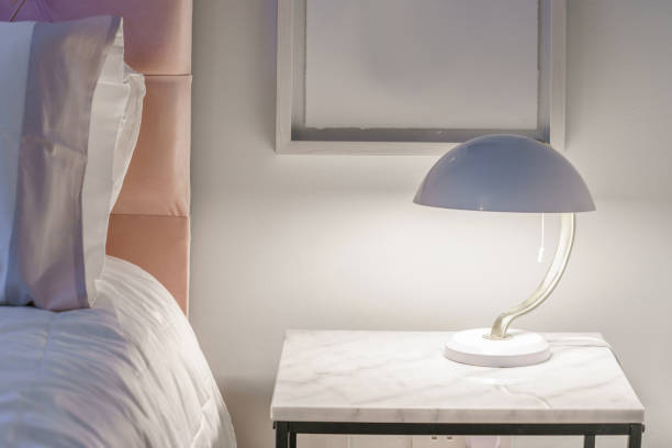 Decorative night lamp on a shelf in a bedroom