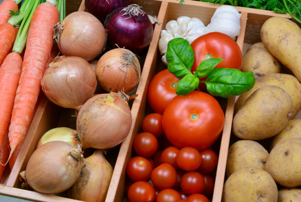 a lot of colorful vegetable in the kitchen.