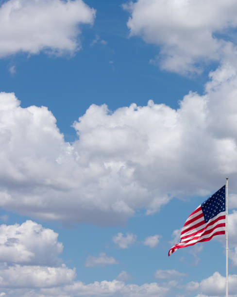 istock USA Flag waving on a beautiful summer day 1021945252