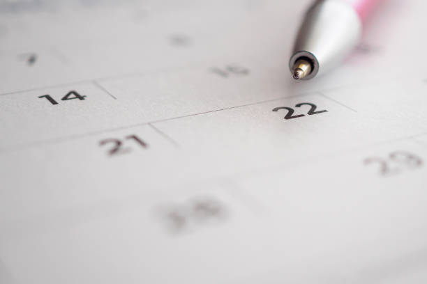 istock Calendar page with pen point at 22nd date 1021950294