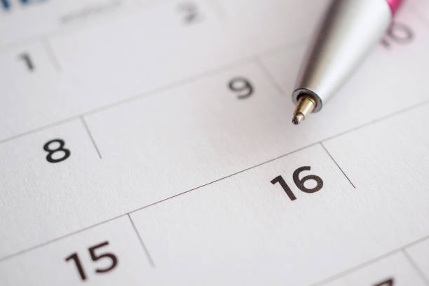 istock Calendar page with pen point at 16th date 1021950300