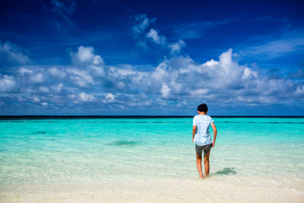 istock A young boy by the sea 1021980476