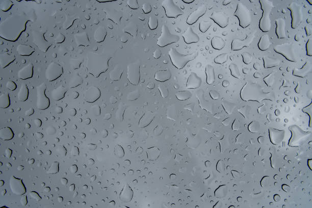 istock Abstract Image of Rain on Glass 1021980700