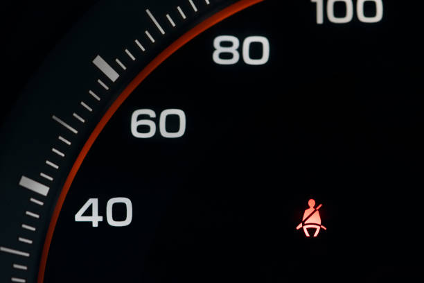 istock Car speedometer with the dashboard fasten seat belt sign. 1021990948