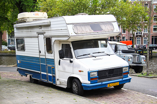 Amsterdam, Netherlands - August 10, 2014: Old campervan Fiat Ducato in the city street.