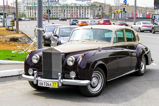 Moscow, Russia - May 6, 2012: Retro motor car Rolls-Royce Silver Cloud in the city street.