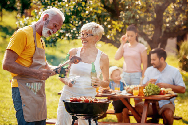istock Family having a barbecue in a park 1022069188