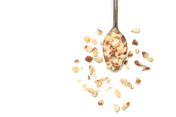 istock Diced Almond in a spoon on white background 1022069224