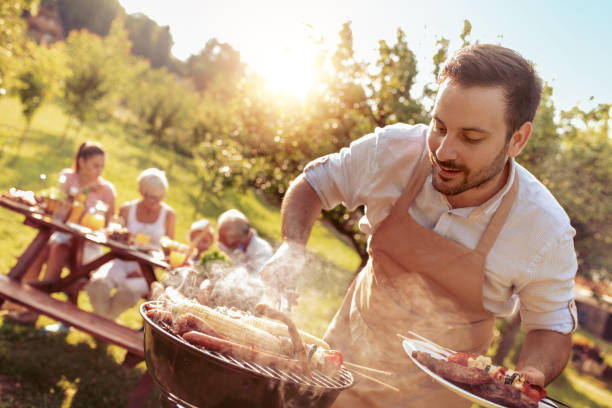 istock Family having a barbecue in a park 1022069452
