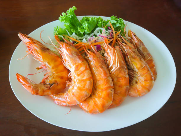 istock Prawns grill on white plate 1022072578