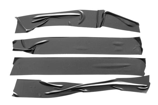 istock Set of black tapes on white background. Torn horizontal and different size black sticky tape, adhesive pieces. 1022078082