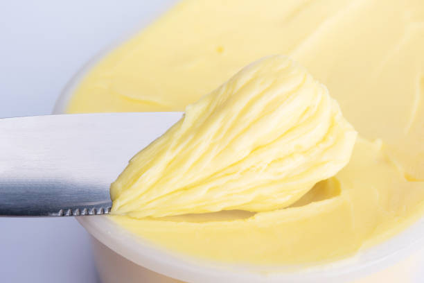 istock Cheese butter or margarine with knife 1022078766