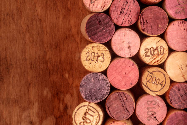 istock Wine corks background, overhead photo of red and white wine corks with copy space 1022091288