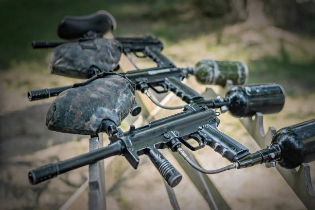 istock Paintball equipment. Special gun marker ready for play 1022092040