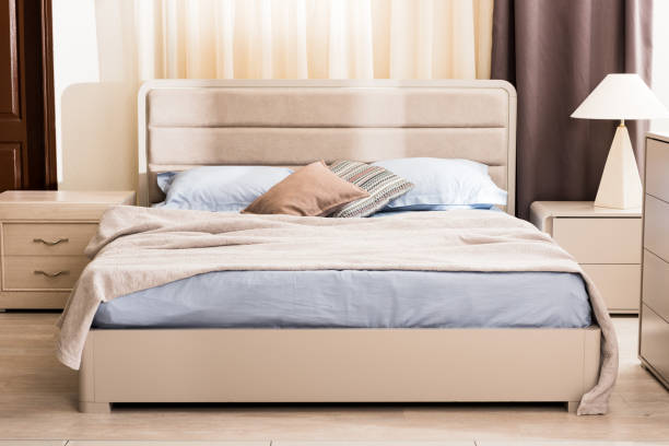 istock interior of modern bedroom with soft bed and pillows 1022092098