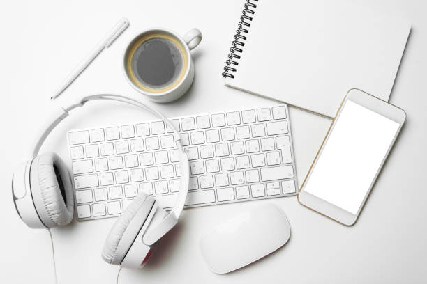 istock Office desk table with computer, supplies, coffee cup 1022092198