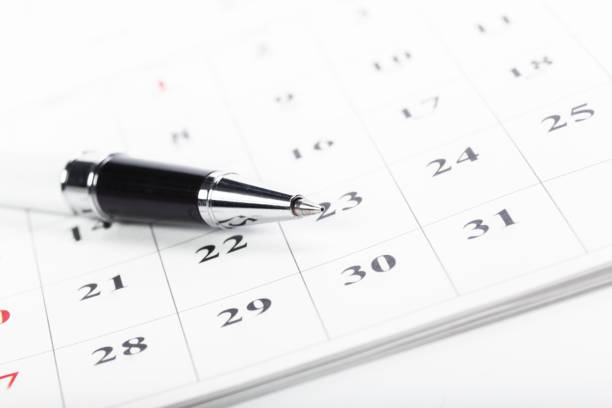 istock Check out the dates in a business calendar concept 1022101662