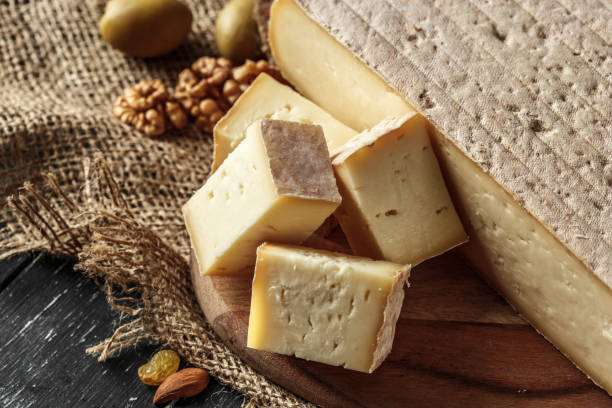 istock Cheese on the wooden table 1022105212
