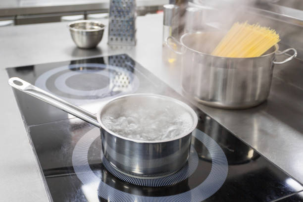 istock Stove counter in a modern restaurant kitchen 1022105612